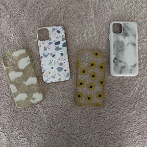 Bundle of Iphone 11 cases. Has some wear.